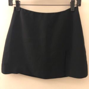 Bebe black mini skirt with slit size 2